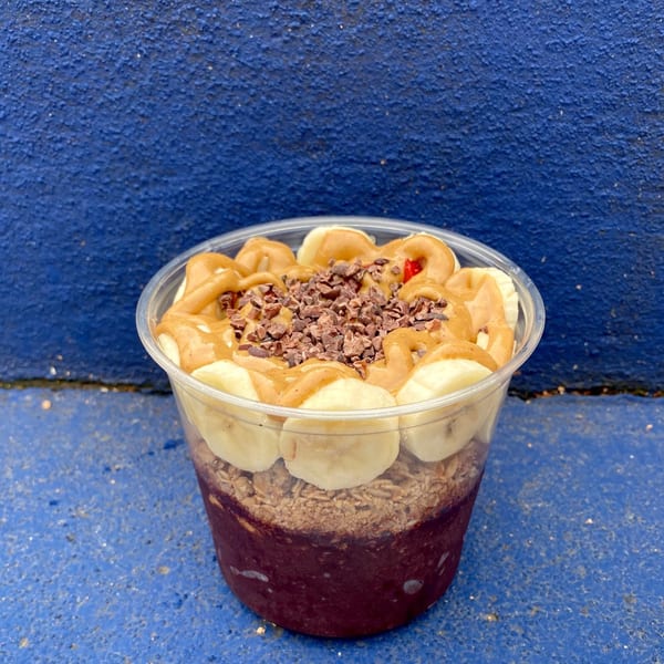 A Twenty Two Juice Bar acai bowl with bananas, peanut butter, and cacao nibs.